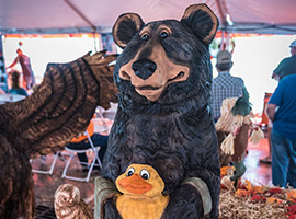 Swimming Bear Chainsaw Carving