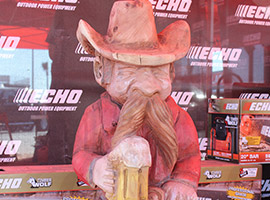 Cowboy and Boots Chainsaw Carving